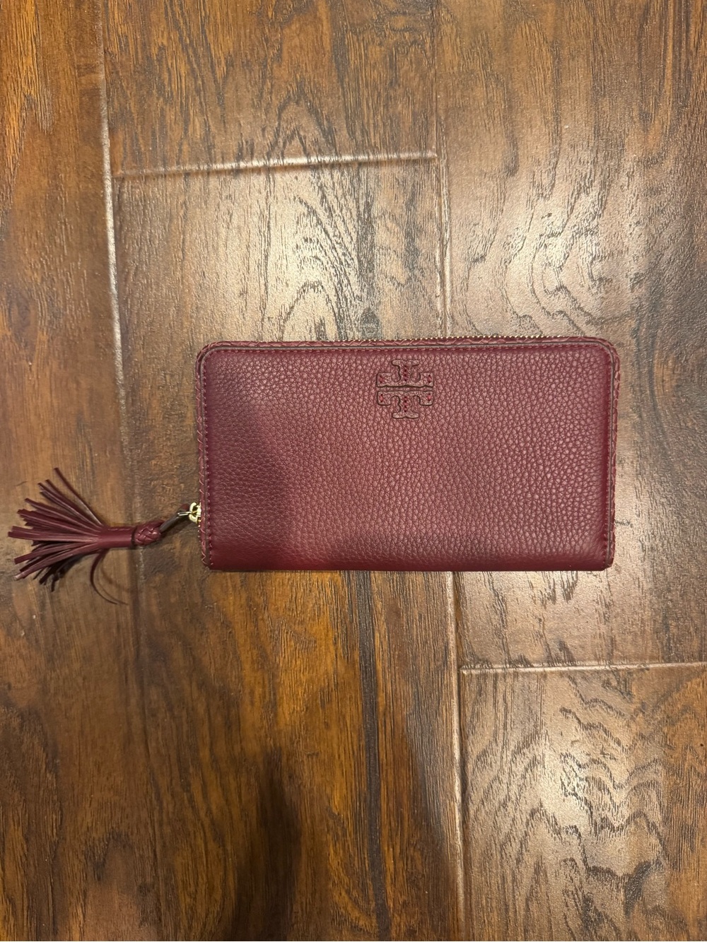 Tory Burch Pebbled Leather Zip Wallet in Burgundy with Tassel